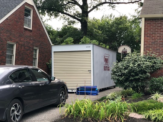 a portable storage unit in a driveway